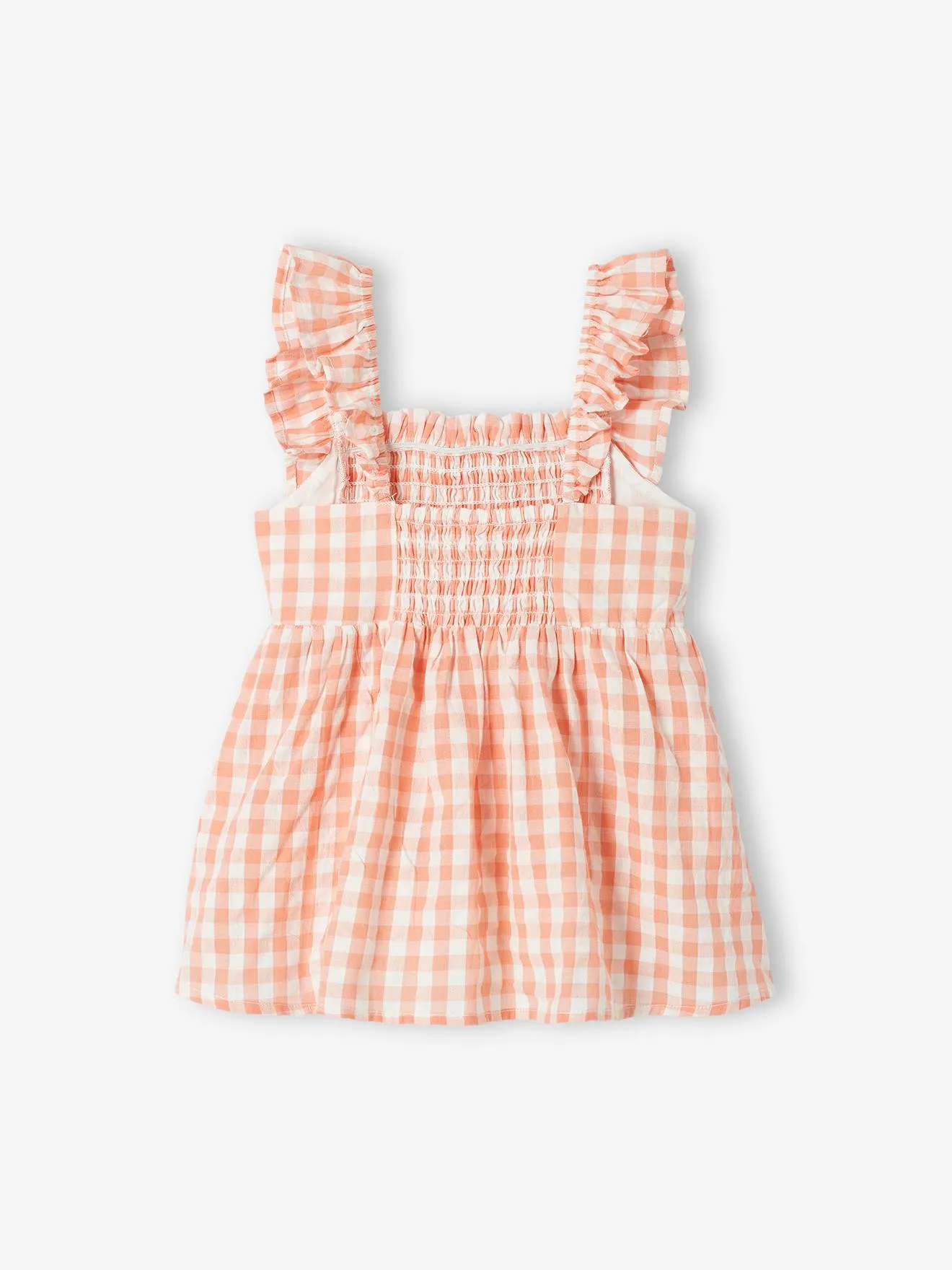 Blusa con smocks y tirantes con volantes para niña