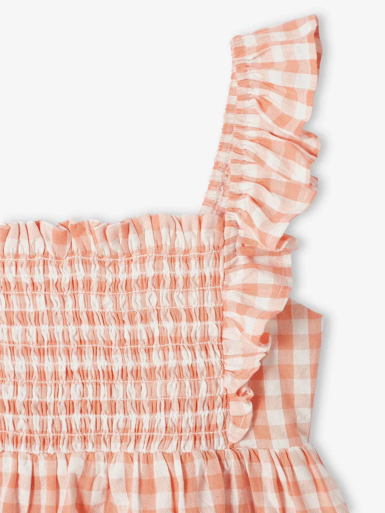 Blusa con smocks y tirantes con volantes para niña