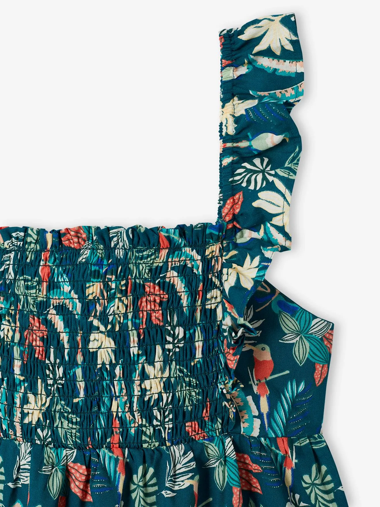 Blusa con smocks y tirantes con volantes para niña