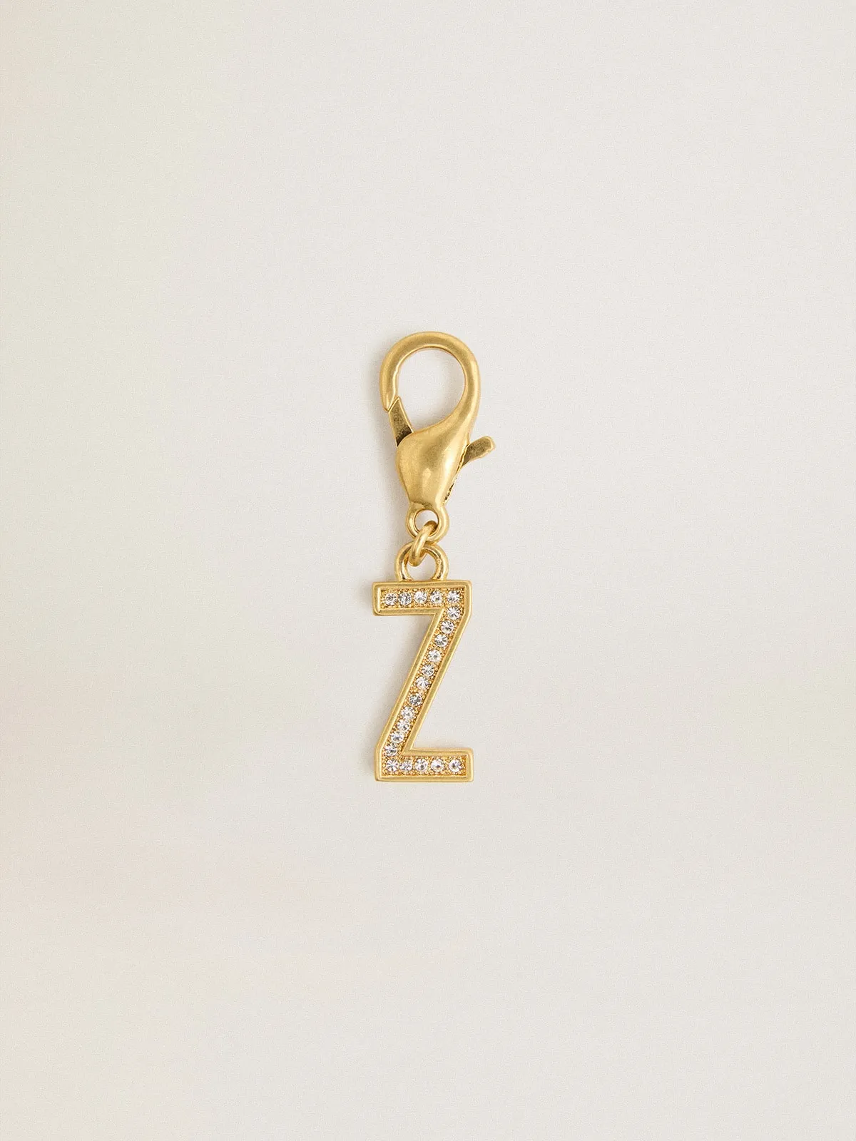 Dije de latón con forma de letra Z color dorado con cristales
