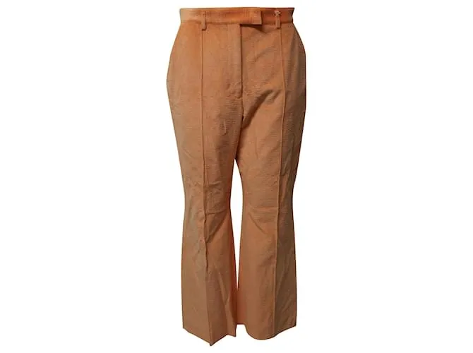 Pantalones de pana naranja con dobladillo acampanado de Acne Studios 