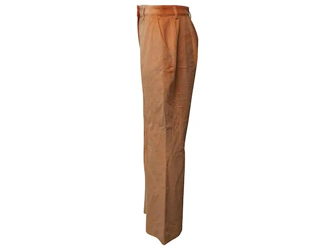 Pantalones de pana naranja con dobladillo acampanado de Acne Studios 