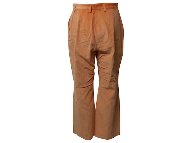 Pantalones de pana naranja con dobladillo acampanado de Acne Studios 
