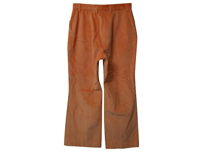Pantalones de pana naranja con dobladillo acampanado de Acne Studios 